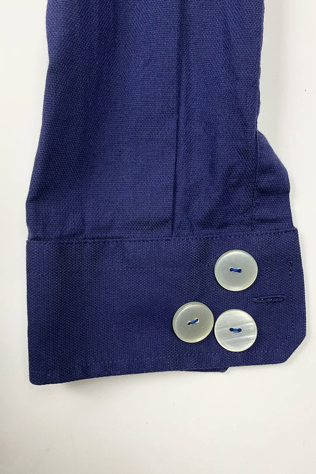 shirt cuffs with beige buttons