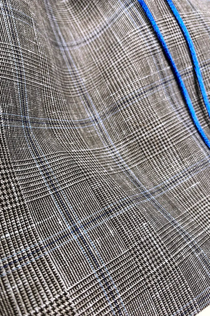 Close-up of a textured fabric with a checkered pattern
