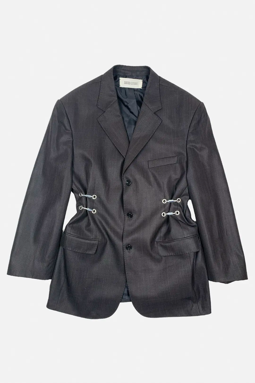 Dark brown blazer with silver hardware on a light gray background