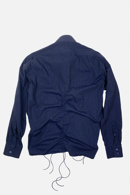 Navy blue shirt with a unique design on a white background