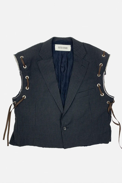 brown pinstripe vest with metal accents and brown cargo pants on a white background