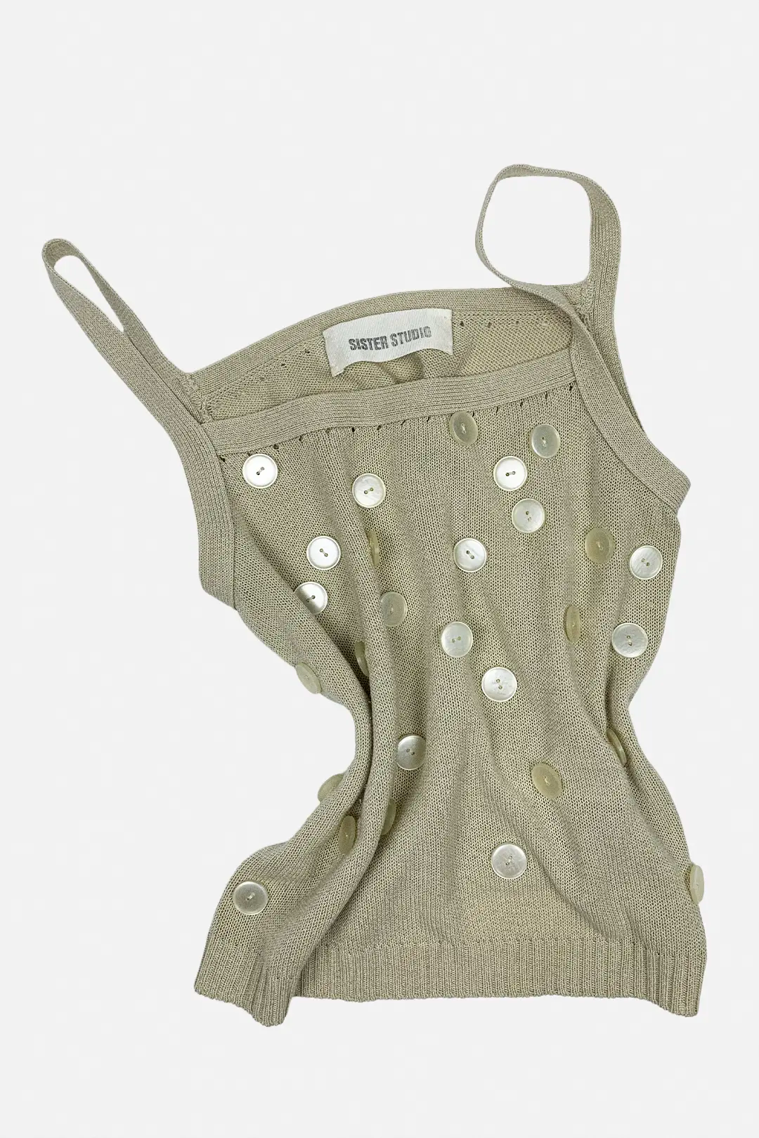 beige tank top with button details on a white background