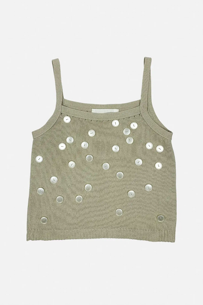 beige tank top with button details on a white background